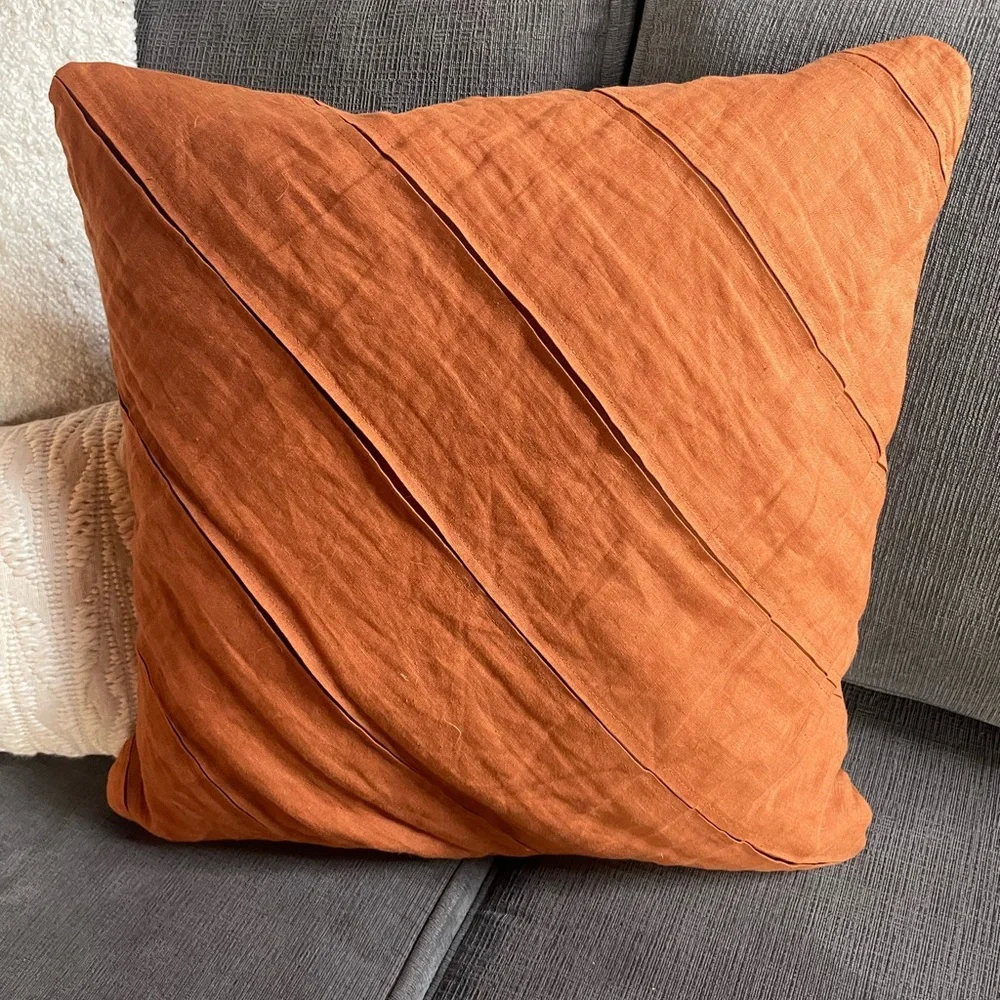 Crate & Barrel burnt orange pillow cover